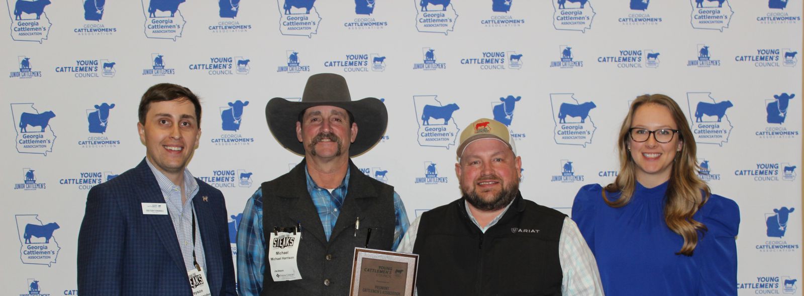 Group of young people holding awards